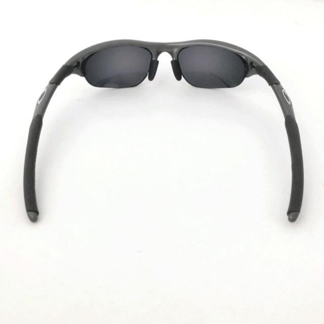 Oakley(オークリー)のオークリー サングラス - 黒×ダークグレー レディースのファッション小物(サングラス/メガネ)の商品写真