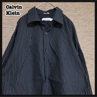 カルバンクライン(Calvin Klein)の【カルバンクライン】長袖シャツ　ストライプ　黒　縦じま　シック　シンプルJA(シャツ)