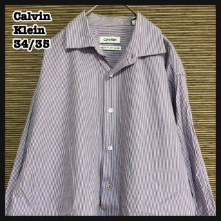 カルバンクライン(Calvin Klein)の【カルバンクライン】長袖シャツ　ストライプ　紫　縦じま　シック　パープルJA(シャツ)