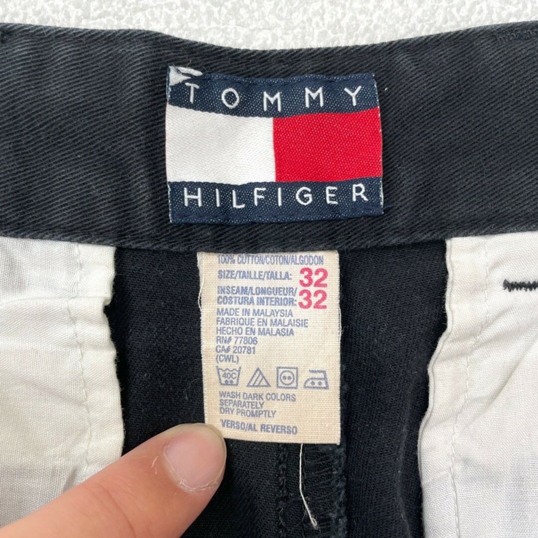 TOMMY HILFIGER(トミーヒルフィガー)のトミー ヒルフィガー TOMMY HILFIGER チノパンツ ツータック ロゴ 刺繍 サイズ：W32 L30 ブラック 【中古】 メンズのスーツ(スラックス/スーツパンツ)の商品写真