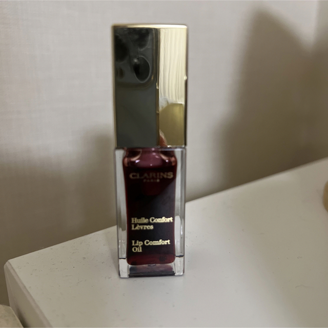 CLARINS(クラランス)の美品 クラランス Lip Comfort Oil コスメ/美容のベースメイク/化粧品(リップグロス)の商品写真