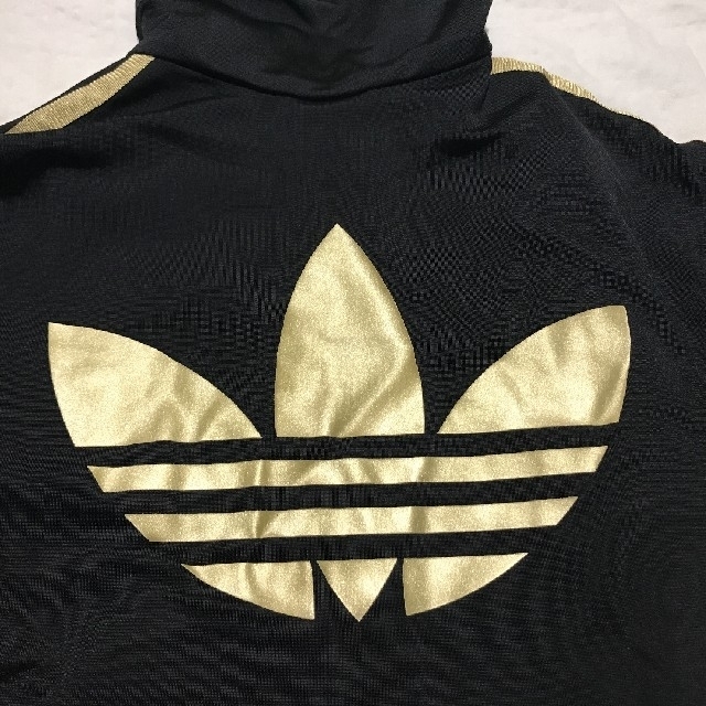 Originals（adidas）(オリジナルス)のアディダス　オリジナルス　ジャージ  黒×金 レディースのトップス(その他)の商品写真