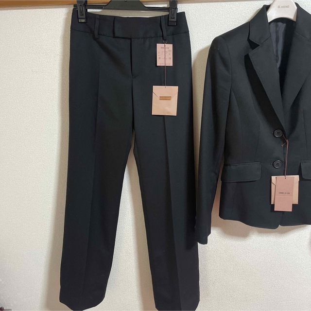 コムサイズ　黒　スーツ　新品未使用　xs