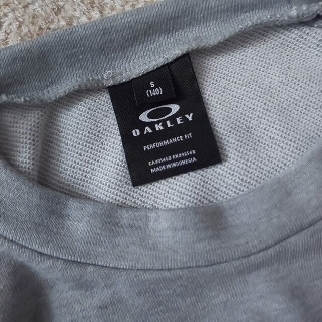 Oakley(オークリー)のm.様専用 OAKLEY ﾄﾚｰﾅｰ 140㎝ ｵｰｸﾘｰ キッズ/ベビー/マタニティのキッズ服男の子用(90cm~)(Tシャツ/カットソー)の商品写真