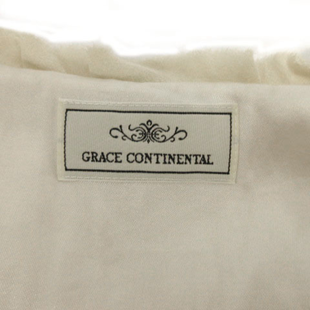 GRACE CONTINENTAL(グレースコンチネンタル)のグレースコンチネンタル ボレロ 半袖 リボン留 シルク ベロア アイボリー 36 レディースのフォーマル/ドレス(礼服/喪服)の商品写真