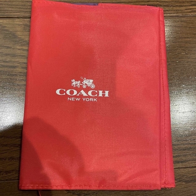 COACH(コーチ)のCOACH  ポケット付きブックカバー  雑誌付録 ハンドメイドの文具/ステーショナリー(ブックカバー)の商品写真