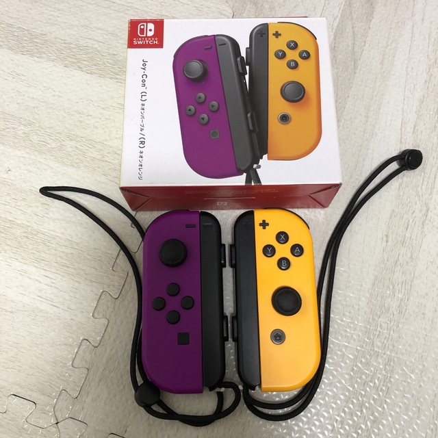 Nintendo Switch(ニンテンドースイッチ)の【アン様専用】　　ジョイコン　ネオンパープル　ネオンオレンジ　中古 エンタメ/ホビーのゲームソフト/ゲーム機本体(その他)の商品写真