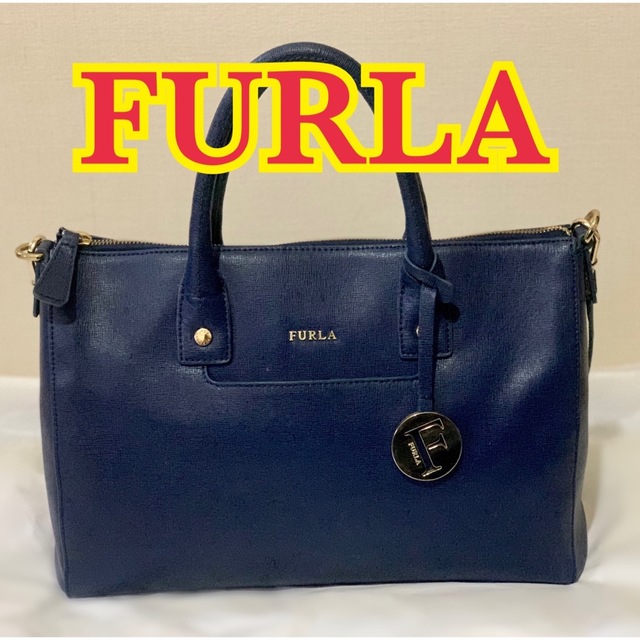 Furla(フルラ)のFURLA フルラ ハンドバッグ　2way 肩紐付き ネイビー レディースのバッグ(ショルダーバッグ)の商品写真