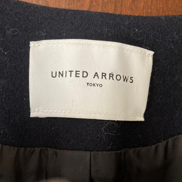 UNITED ARROWS(ユナイテッドアローズ)のユナイテッドアローズ  36 ネイビー　ノーカラーコート レディースのジャケット/アウター(ロングコート)の商品写真