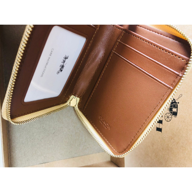 COACH コンパクトファスナー財布　イエロー