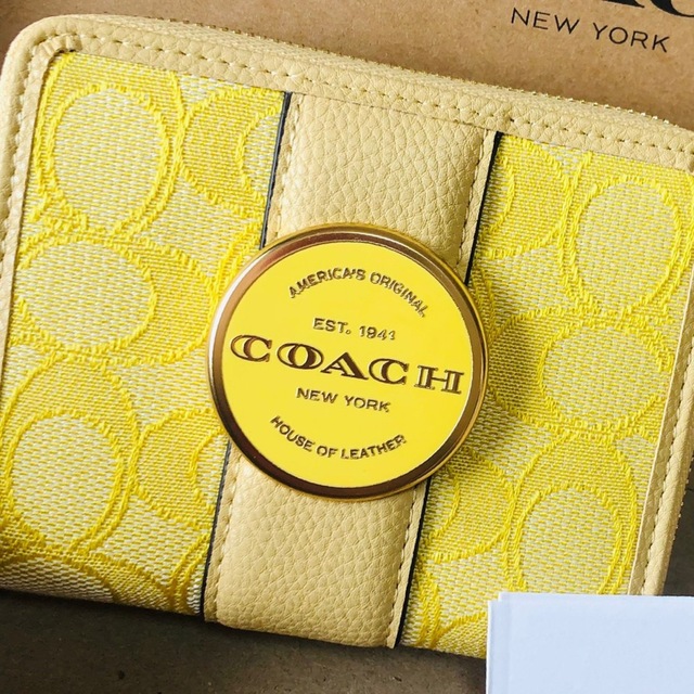 COACH コンパクトファスナー財布　イエロー