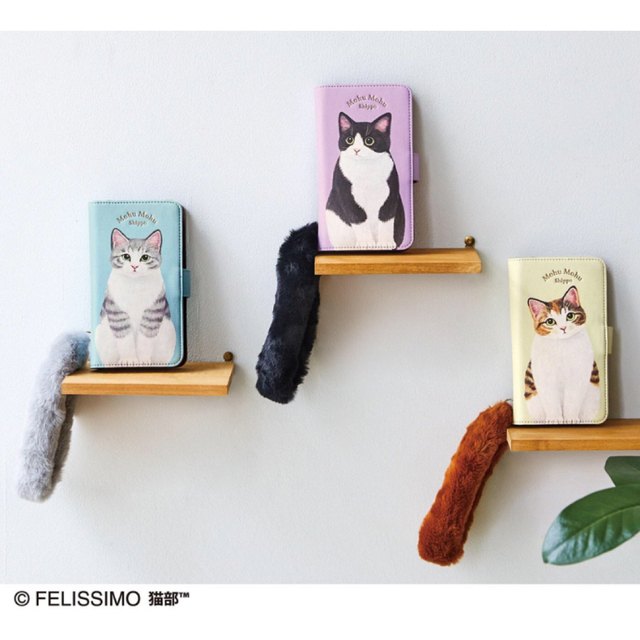 FELISSIMO(フェリシモ)の猫のしっぽストラップ付き　マルチスマホカバー　ハチワレ　新品　フェリシモ猫部 スマホ/家電/カメラのスマホアクセサリー(iPhoneケース)の商品写真