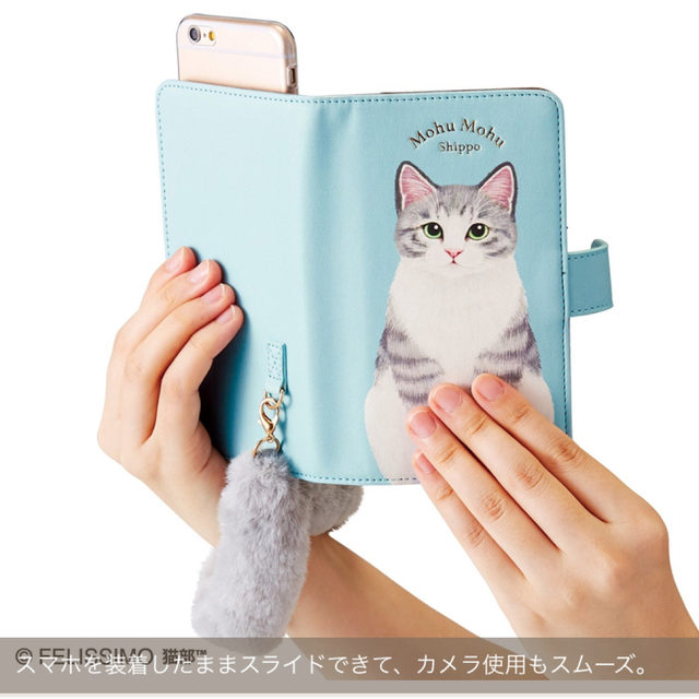 FELISSIMO(フェリシモ)の猫のしっぽストラップ付き　マルチスマホカバー　ハチワレ　新品　フェリシモ猫部 スマホ/家電/カメラのスマホアクセサリー(iPhoneケース)の商品写真