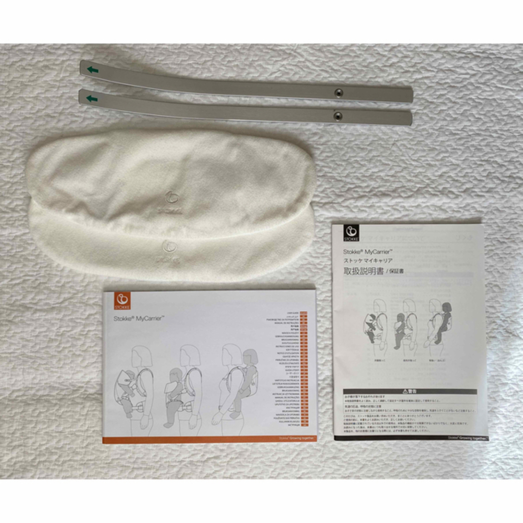 Stokke(ストッケ)の【値下げ】STOKKE マイキャリア フロント＆バッグ／未使用ビブセット キッズ/ベビー/マタニティの外出/移動用品(抱っこひも/おんぶひも)の商品写真