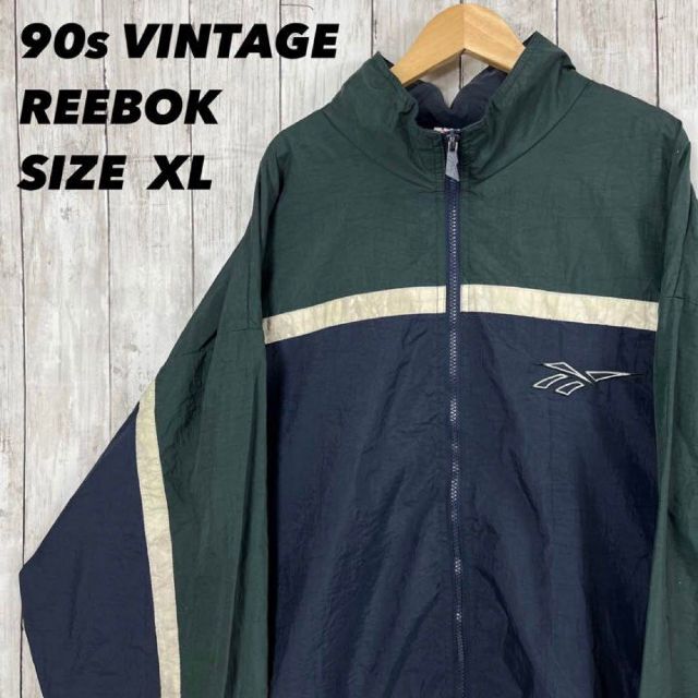 Reebok(リーボック)の90sヴィンテージ古着REEBOKゆるだぼXL刺繍ロゴナイロンジャケットネイビー メンズのジャケット/アウター(ナイロンジャケット)の商品写真