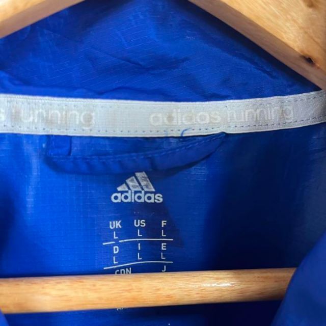 adidas(アディダス)のユニセックス古着ADIDASアディダスジップアップロゴプリントアノラックLブルー メンズのジャケット/アウター(ブルゾン)の商品写真