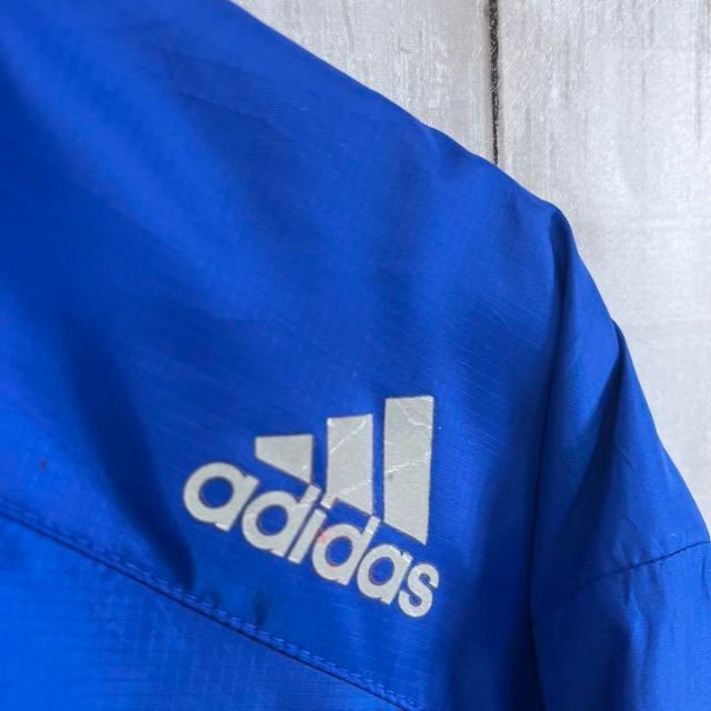 adidas(アディダス)のユニセックス古着ADIDASアディダスジップアップロゴプリントアノラックLブルー メンズのジャケット/アウター(ブルゾン)の商品写真