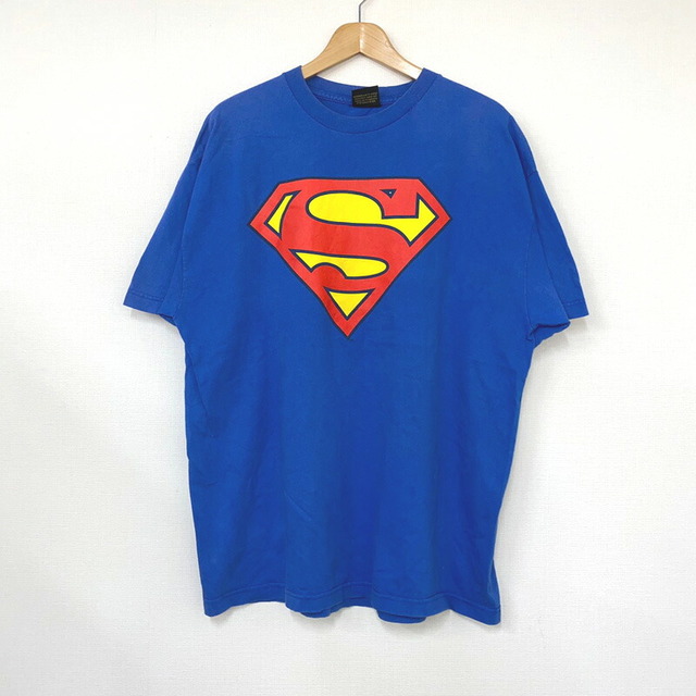 WARNER BROS ワーナーブラザーズ スーパーマン SUPER MAN 半袖 Tシャツ プリント サイズ：L位 ブルー×レッド×イエロー古着 【中古】 メンズのトップス(Tシャツ/カットソー(半袖/袖なし))の商品写真