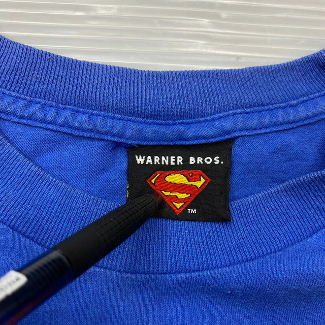 WARNER BROS ワーナーブラザーズ スーパーマン SUPER MAN 半袖 Tシャツ プリント サイズ：L位 ブルー×レッド×イエロー古着 【中古】 メンズのトップス(Tシャツ/カットソー(半袖/袖なし))の商品写真