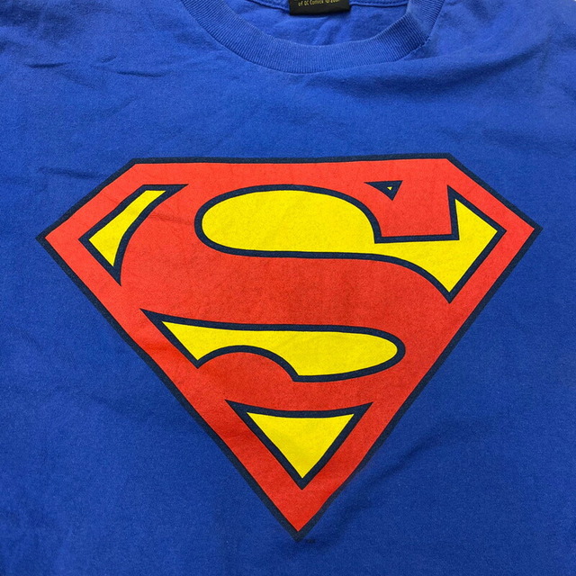 WARNER BROS ワーナーブラザーズ スーパーマン SUPER MAN 半袖 Tシャツ プリント サイズ：L位 ブルー×レッド×イエロー古着 【中古】 メンズのトップス(Tシャツ/カットソー(半袖/袖なし))の商品写真