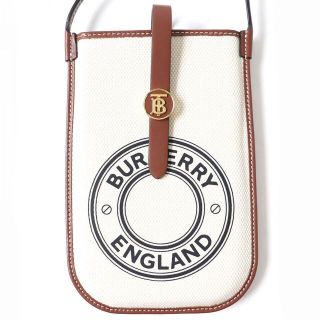 バーバリー(BURBERRY)の極美品△バーバリー ロンドン イングランド ロゴグラフィック キャンバス アン フォンケース ウィズ ストラップ ポーチ ホワイト×タン(ボディバッグ/ウエストポーチ)