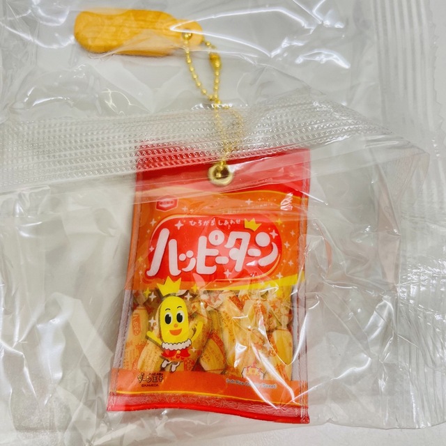 亀田製菓(カメダセイカ)の【新品・未開封】亀田製菓 ハッピーターン❤︎ガチャガチャ エンタメ/ホビーのおもちゃ/ぬいぐるみ(キャラクターグッズ)の商品写真