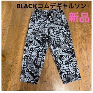 ブラックコムデギャルソン(BLACK COMME des GARCONS)の新品タグ付き　BLACKコムデギャルソン総柄プリント柄パンツ(スラックス)