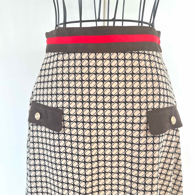 LOVELESS(ラブレス)の☆さら様専用♡☆美品☆ラブレス スカート 総柄 金ボタン フレアスカート レディースのスカート(ひざ丈スカート)の商品写真
