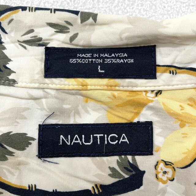 NAUTICA(ノーティカ)のノーティカ NAUTICA アロハ シャツ 半袖 ヤシの木･花柄 総柄 サイズ：L アイボリー×イエロー×グリーン古着 【中古】 メンズのトップス(シャツ)の商品写真