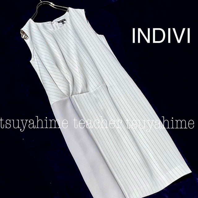 INDIVI(インディヴィ)のアシンメリトリーワンピース タック 配色 ドレープ  ストライプ 白 グレージュ レディースのワンピース(ひざ丈ワンピース)の商品写真