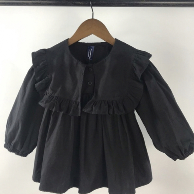 110サイズ 黒ブラック ルーズフリルシャツ 韓国子供服 キッズ/ベビー/マタニティのキッズ服女の子用(90cm~)(ブラウス)の商品写真