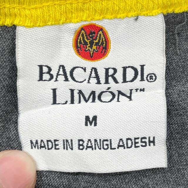 BACARDI LIMON リンガー Tシャツ プリント 半袖 サイズ：M グレー×イエロー 【中古】トリムTシャツ メンズのトップス(Tシャツ/カットソー(半袖/袖なし))の商品写真