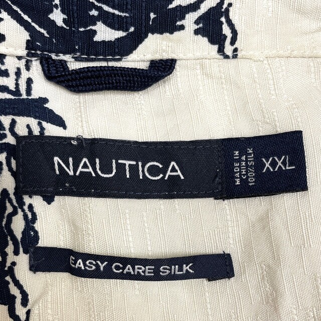 NAUTICA(ノーティカ)のノーティカ NAUTICA シルク アロハ シャツ 開襟 半袖 ヤシの木柄 総柄 サイズ：XXL アイボリー×ネイビー古着 【中古】EASY CARE SILK メンズのトップス(シャツ)の商品写真