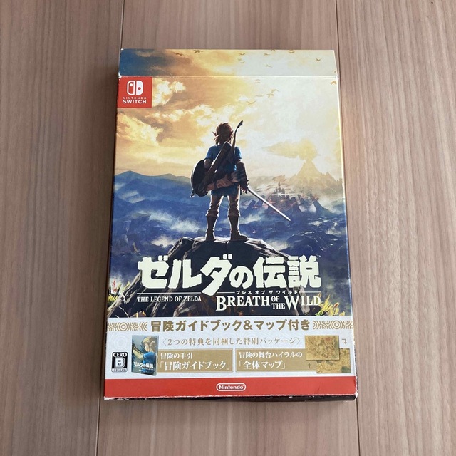 Nintendo Switch(ニンテンドースイッチ)のゼルダの伝説 ブレス オブ ザ ワイルド ～冒険ガイドブック＆マップ付き～ エンタメ/ホビーのゲームソフト/ゲーム機本体(家庭用ゲームソフト)の商品写真