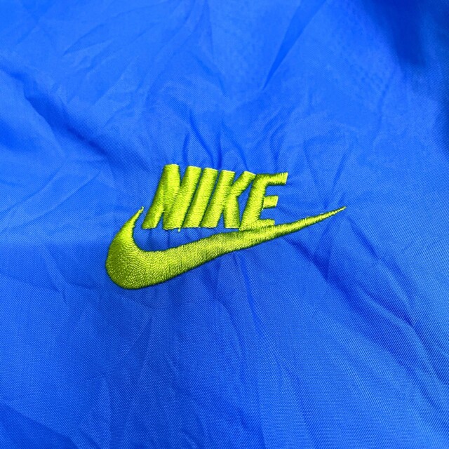 NIKE(ナイキ)の90's ナイキ NIKE ジップアップ ナイロンジャケット ロゴ 刺繍 長袖 サイズ：L ブルー系×ネイビー×イエローグリーン 【中古】 メンズのジャケット/アウター(その他)の商品写真