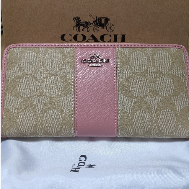 COACH  長財布　シグネチャー　ピンクのワンポイント