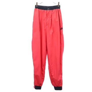 ナイキ(NIKE)のナイキ ナイロンパンツ M レッド系 NIKE 裏メッシュ ジャージ メンズ 【中古】  【230226】(ワークパンツ/カーゴパンツ)