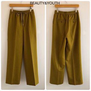 ビューティアンドユースユナイテッドアローズ(BEAUTY&YOUTH UNITED ARROWS)の086B&Yウールライクドロストイージーパンツマスタードイエロー21AW日本製(カジュアルパンツ)