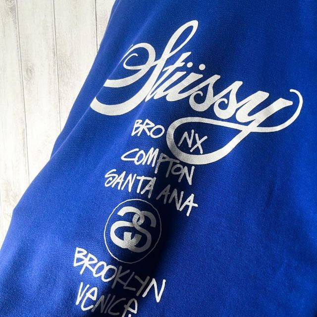 STUSSY(ステューシー)の【美品 USA製 L】ステューシー 両面プリント ワールドツアー スウェット 青 メンズのトップス(スウェット)の商品写真