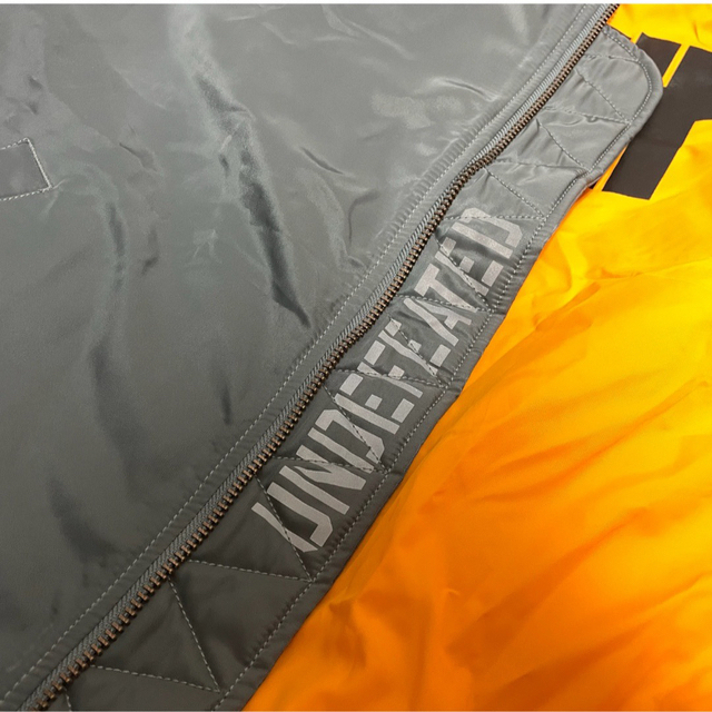 UNDEFEATED(アンディフィーテッド)のUndefeated Converse  Ma-1 XL コンバース フライト メンズのジャケット/アウター(フライトジャケット)の商品写真