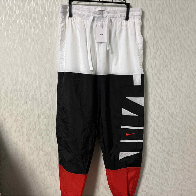 NIKE(ナイキ)のナイキ L ウインドブレーカー パンツ ドライフィット Dri-FIT メンズのパンツ(その他)の商品写真