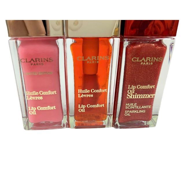 CLARINS(クラランス)の【新品未使用品】クラランス　コンフォートリップオイル　３個セット コスメ/美容のベースメイク/化粧品(リップグロス)の商品写真