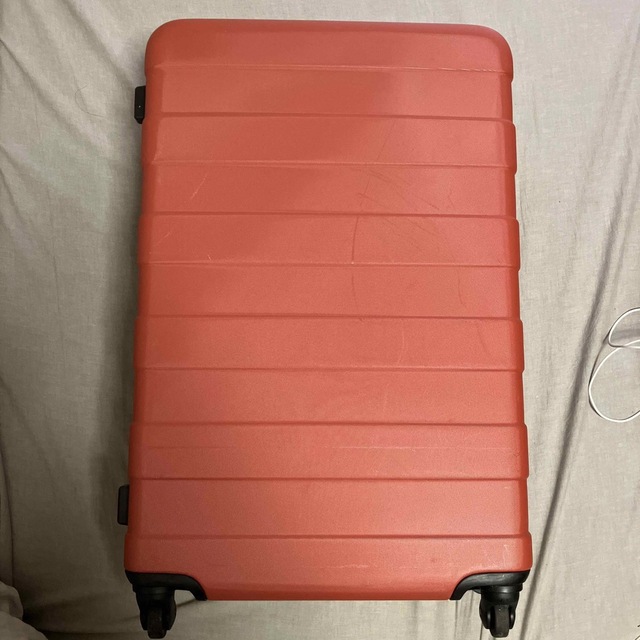 MUJI (無印良品)(ムジルシリョウヒン)の無印良品　旧タイプスーツケース　オレンジ　62L? レディースのバッグ(スーツケース/キャリーバッグ)の商品写真