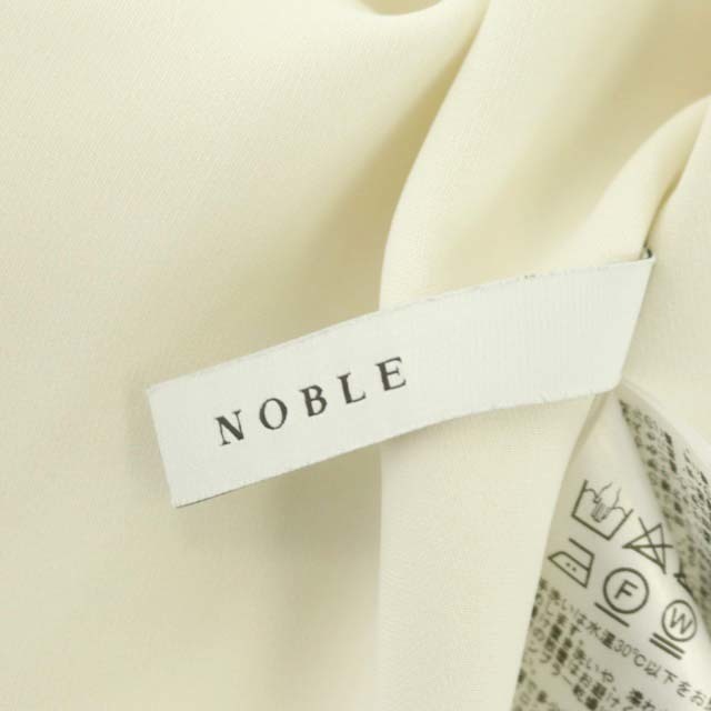 Noble(ノーブル)のノーブル 20SS バイカラーメロータックパフスリーブブラウス 半袖 F 白 黒 レディースのトップス(シャツ/ブラウス(半袖/袖なし))の商品写真