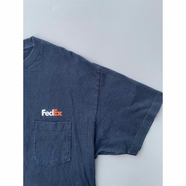 FRUIT OF THE LOOM(フルーツオブザルーム)のフィデックスTシャツFedEx 企業ロゴ 90s ポケT 社員用非売品肉厚T メンズのトップス(Tシャツ/カットソー(半袖/袖なし))の商品写真