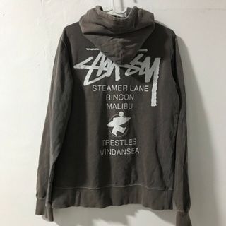 ステューシー(STUSSY)のステューシー　プルオーバーパーカ　サーフマン　チャコールグレー　S(パーカー)