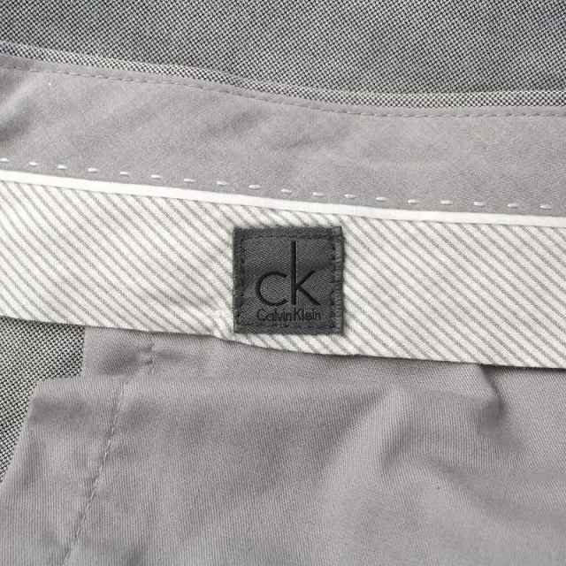 ck Calvin Klein(シーケーカルバンクライン)のカルバンクラインシーケー スラックス パンツ ジップフライ 30 M グレー メンズのパンツ(スラックス)の商品写真