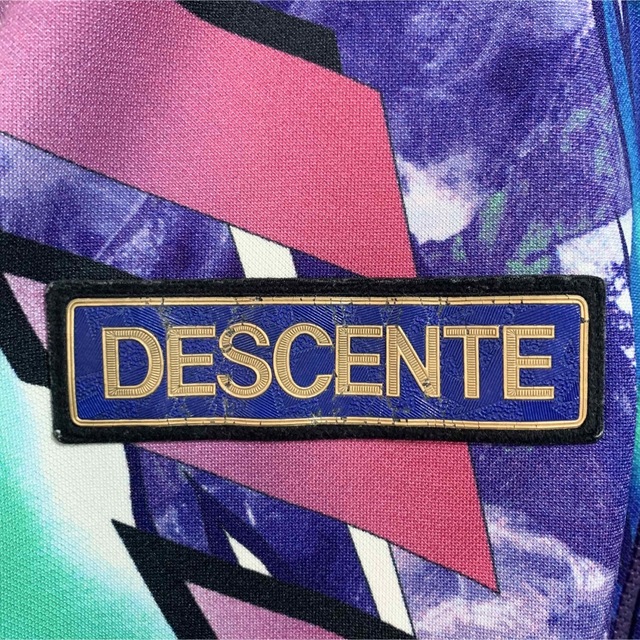 DESCENTE(デサント)の★希少★90s デサント トラックジャケット マルチカラー 総柄 日本製 メンズのトップス(ジャージ)の商品写真