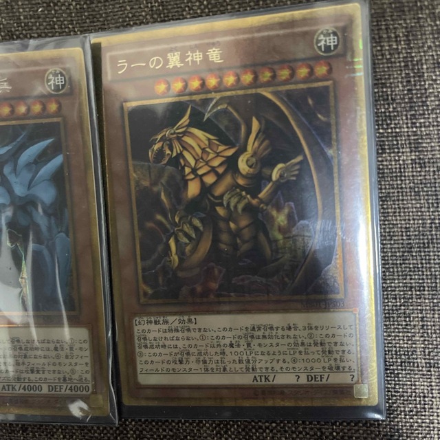 遊戯王(ユウギオウ)の遊戯王　三幻神　ミレニアムゴールドレア（2重スリーブ入り） エンタメ/ホビーのアニメグッズ(カード)の商品写真