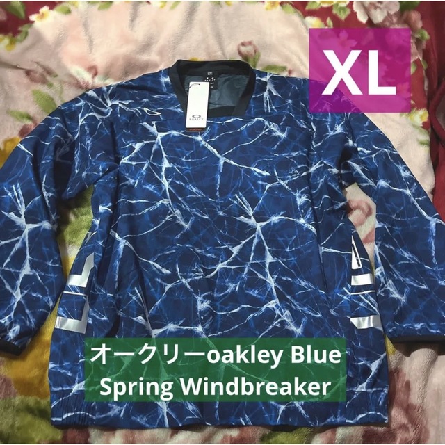 Oakley(オークリー)の春にふさわしい‼️超Blue稲妻オークリーoakley人気ナイロンブレーカーXL メンズのジャケット/アウター(ナイロンジャケット)の商品写真
